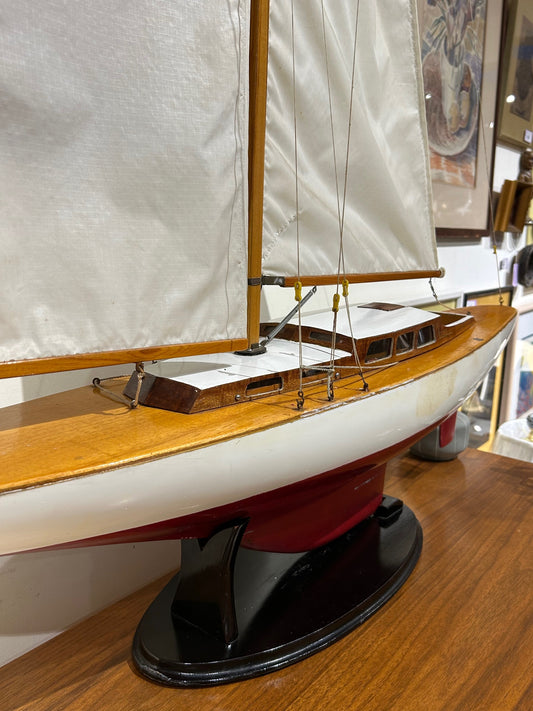 Large Red and White Wooden Sailboat Model on Stand