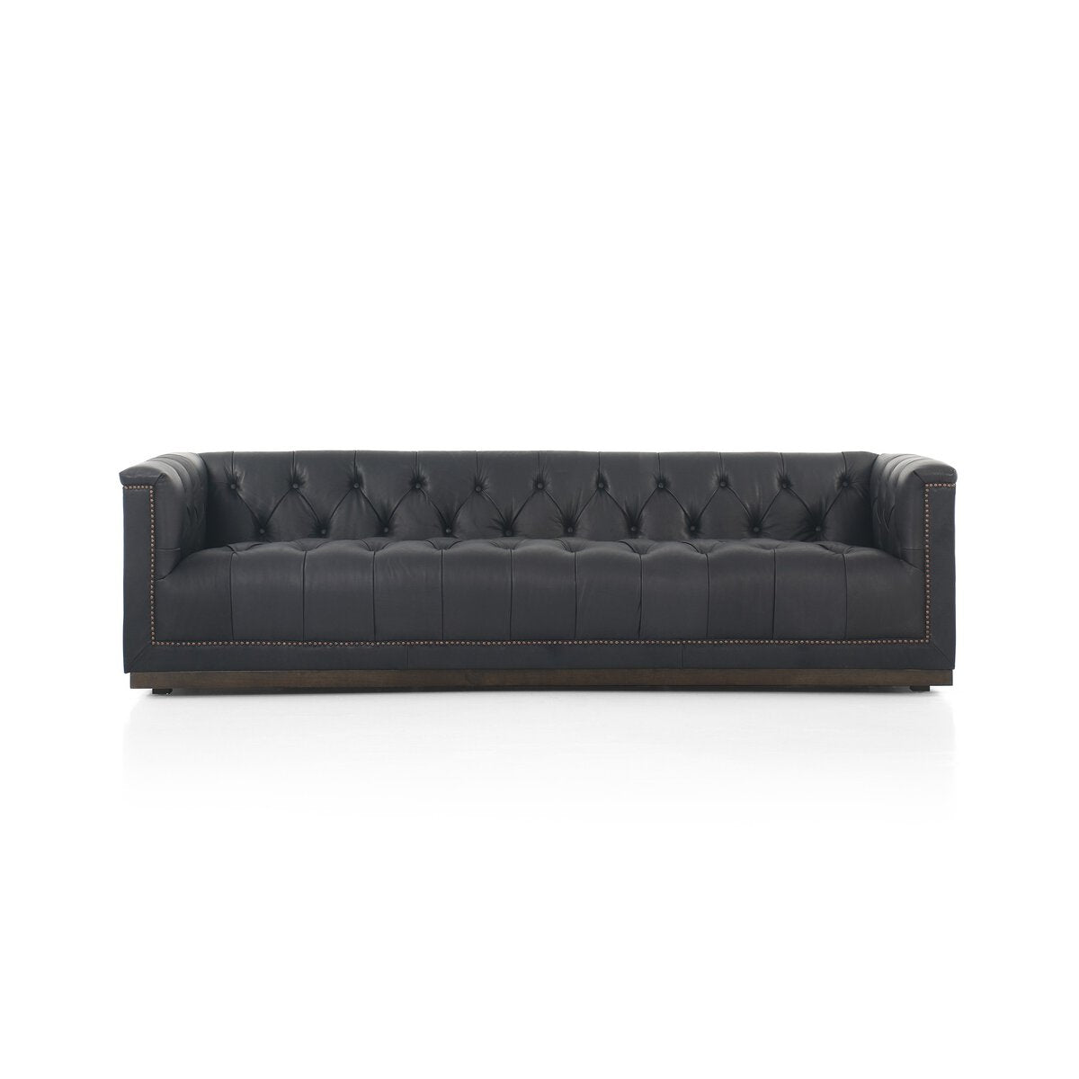 Tufted Distressed Sofa with Bronze Detail