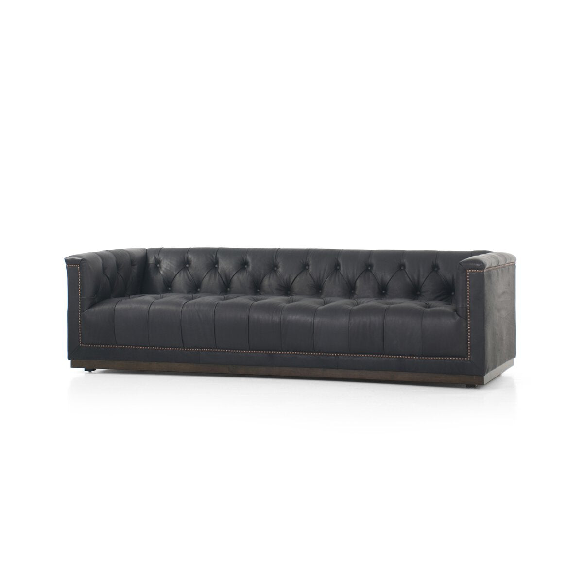 Tufted Distressed Sofa with Bronze Detail