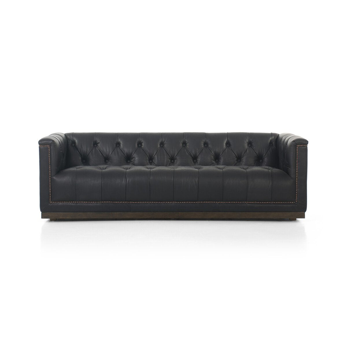 Tufted Distressed Sofa with Bronze Detail