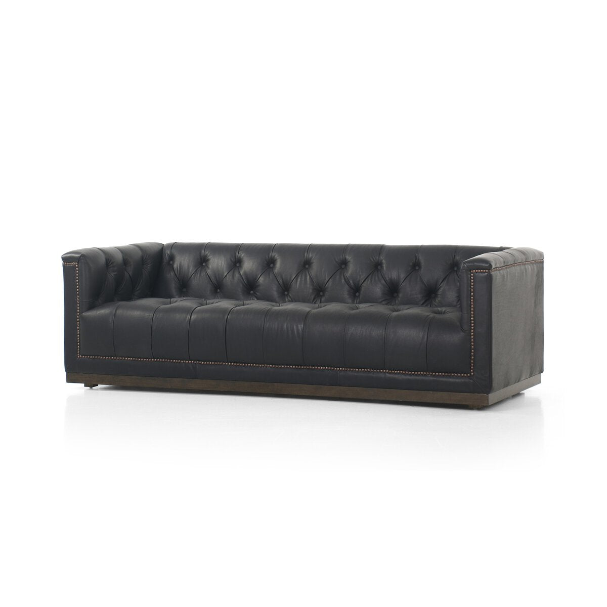 Tufted Distressed Sofa with Bronze Detail