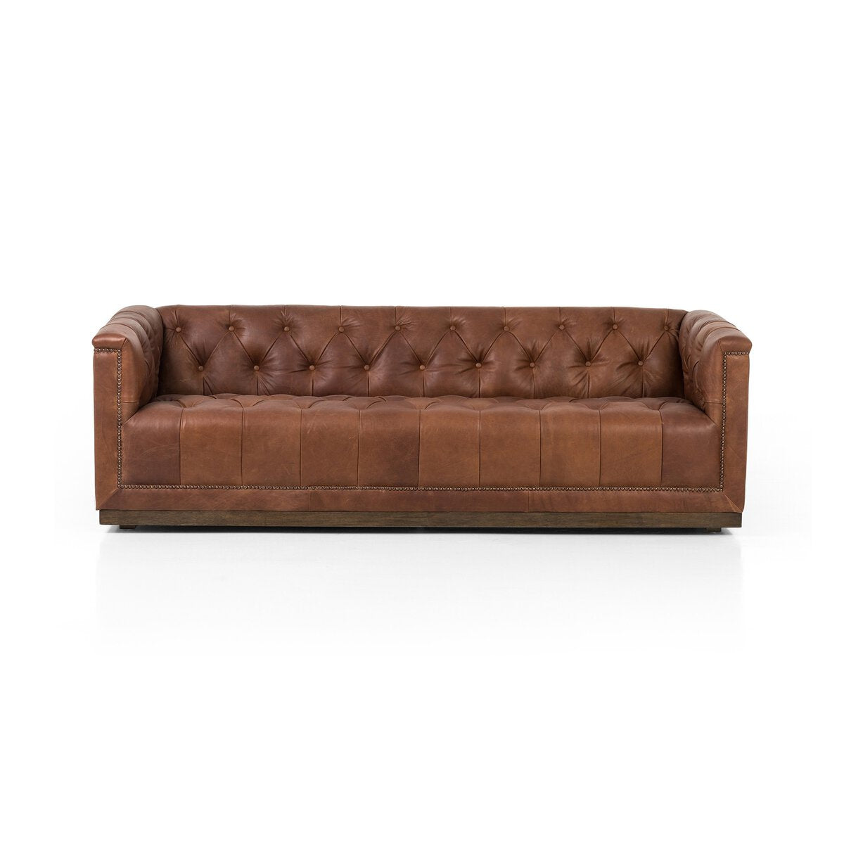 Tufted Distressed Sofa with Bronze Detail