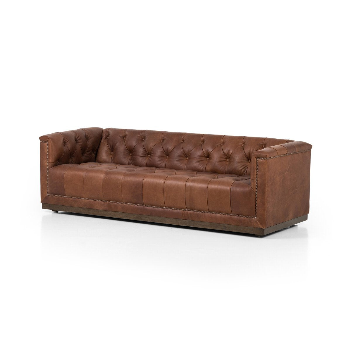 Tufted Distressed Sofa with Bronze Detail