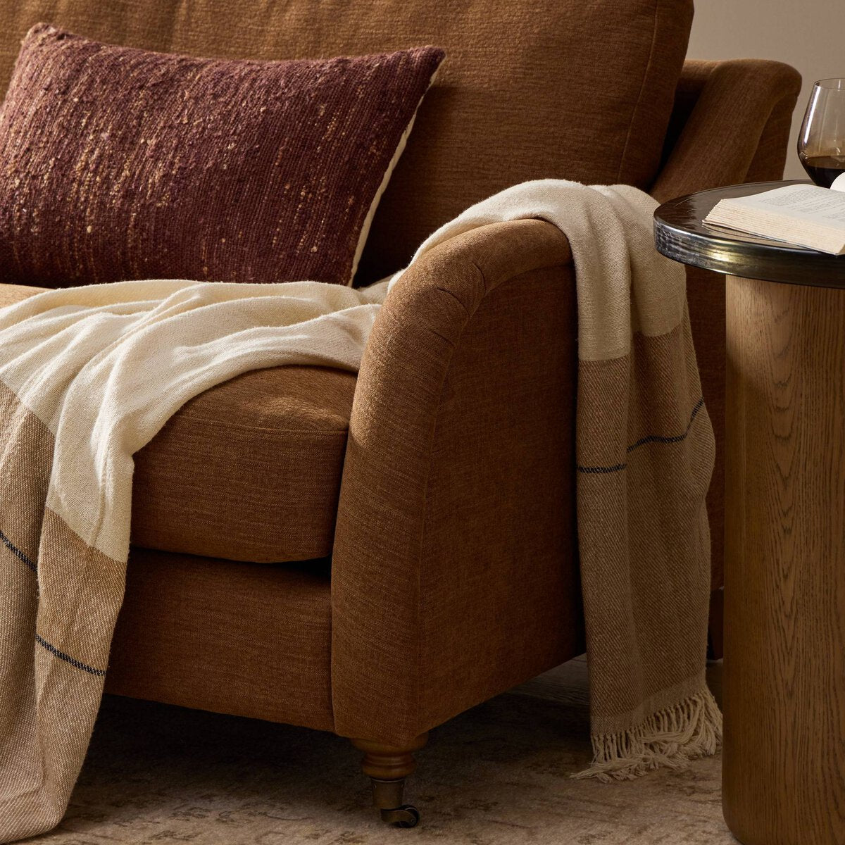 Distressed Leather Rolled Arm Sofa With Caster Legs