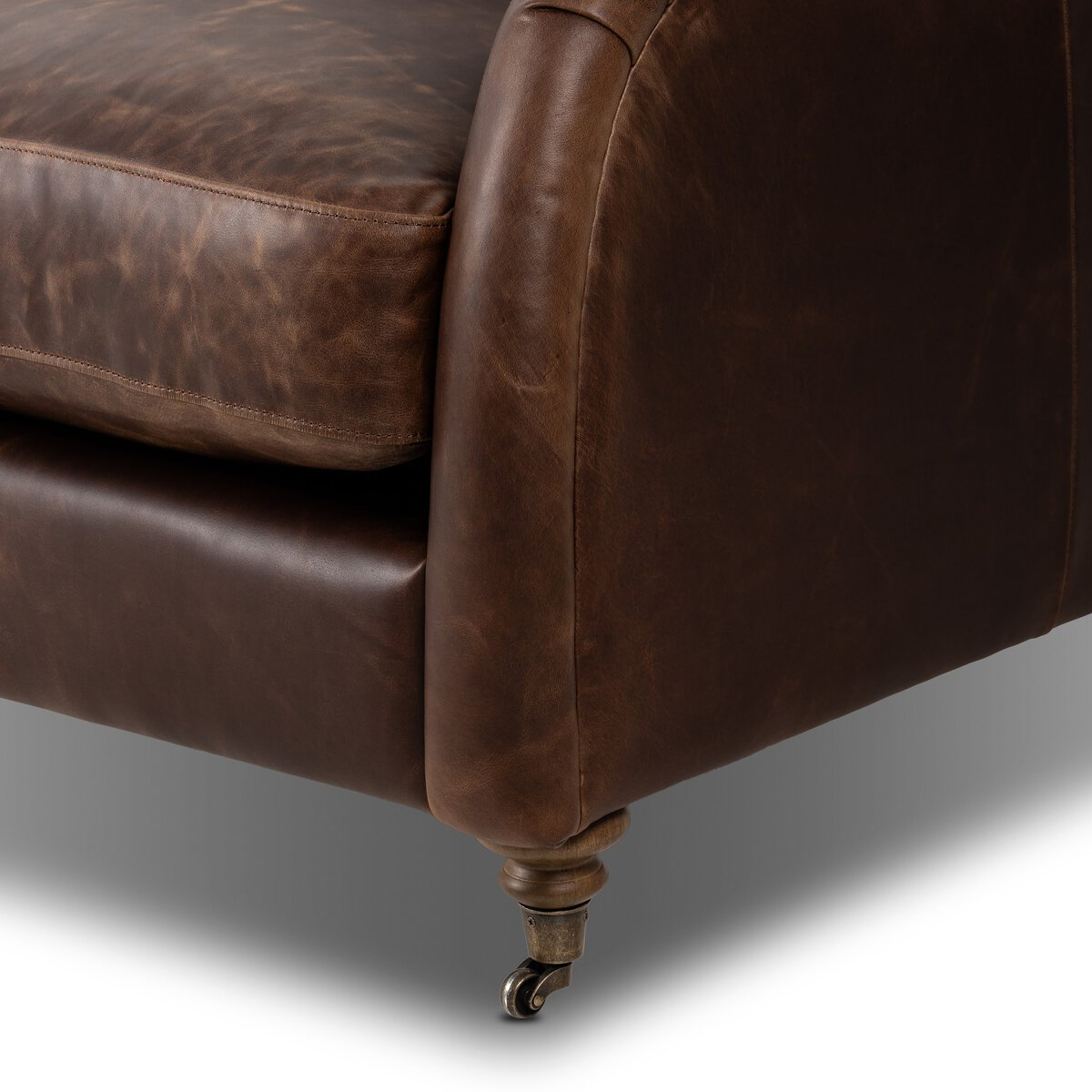 Distressed Leather Rolled Arm Sofa With Caster Legs
