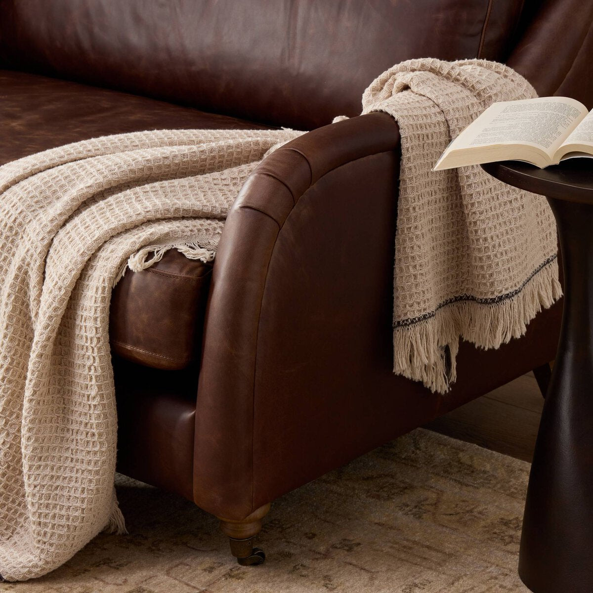 Distressed Leather Rolled Arm Sofa With Caster Legs