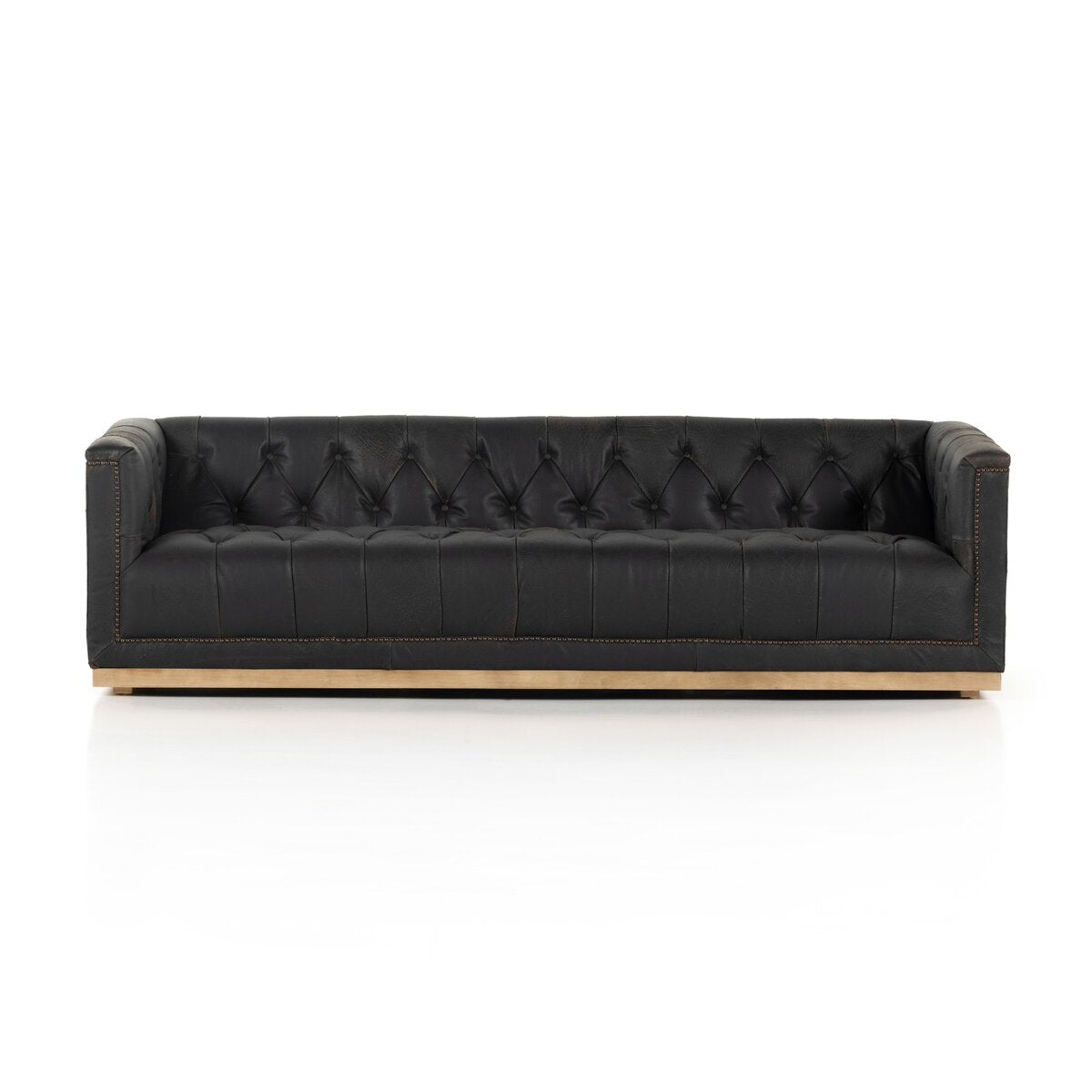 Tufted Distressed Sofa with Bronze Detail