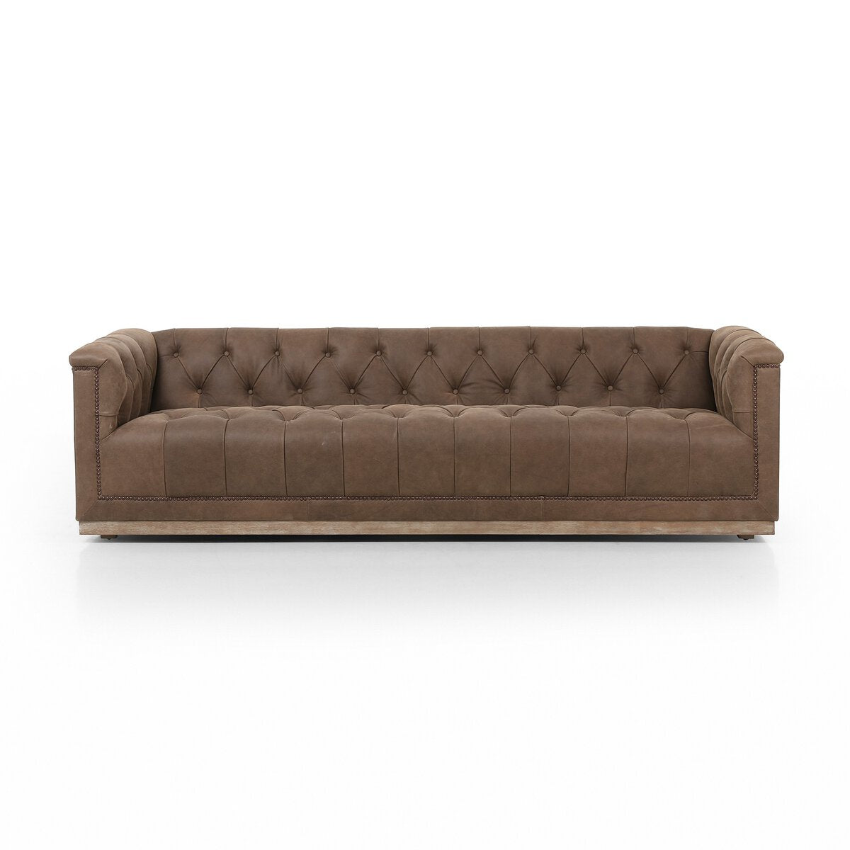 Tufted Distressed Sofa with Bronze Detail