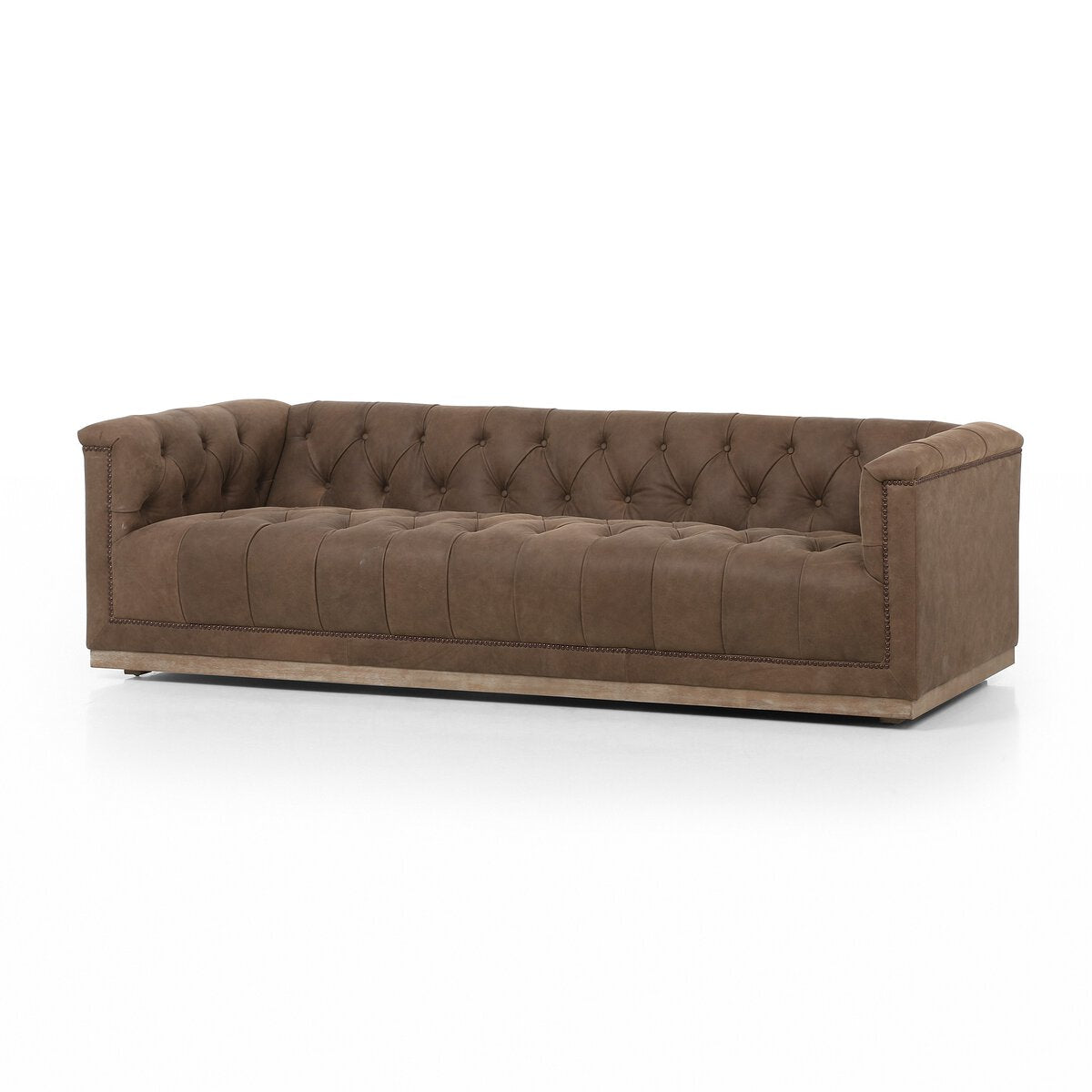 Tufted Distressed Sofa with Bronze Detail