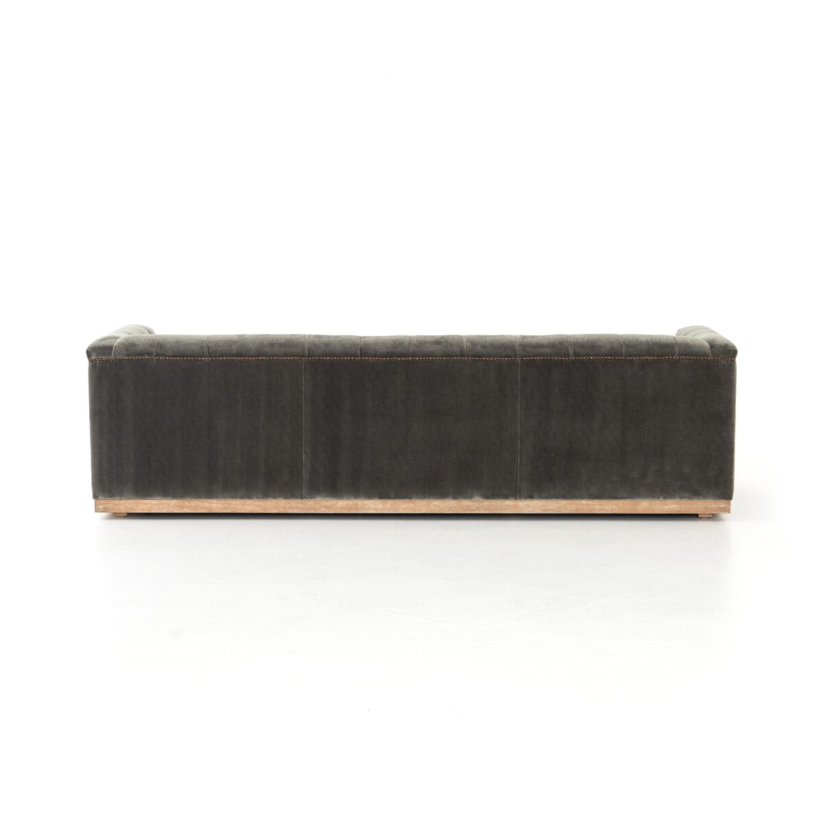 Tufted Distressed Sofa with Bronze Detail