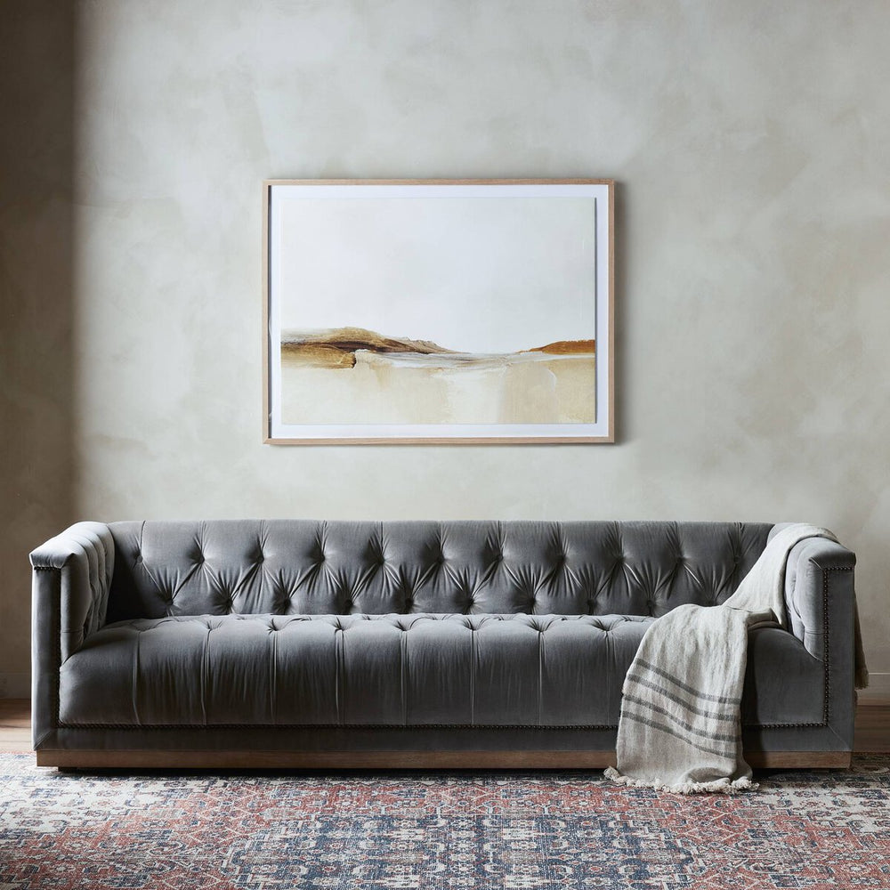 Tufted Distressed Sofa with Bronze Detail