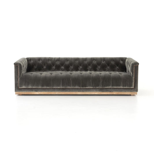 Tufted Distressed Sofa with Bronze Detail