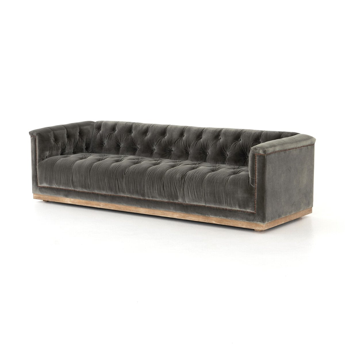 Tufted Distressed Sofa with Bronze Detail