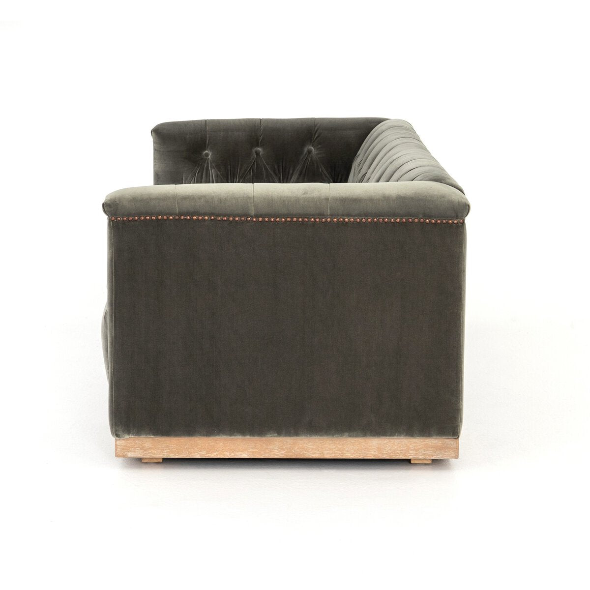 Tufted Distressed Sofa with Bronze Detail