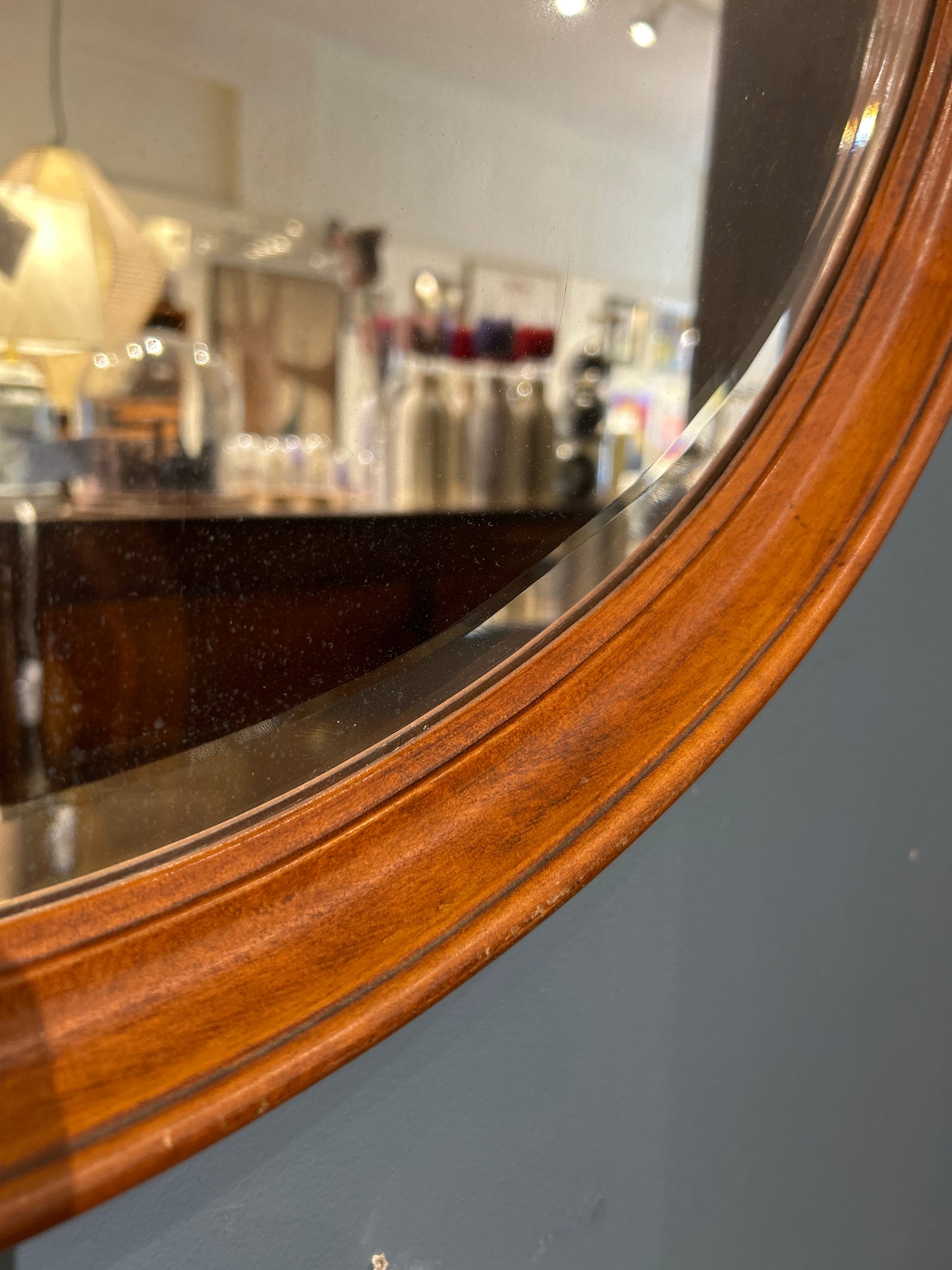 Round Wood and Beveled Mirror