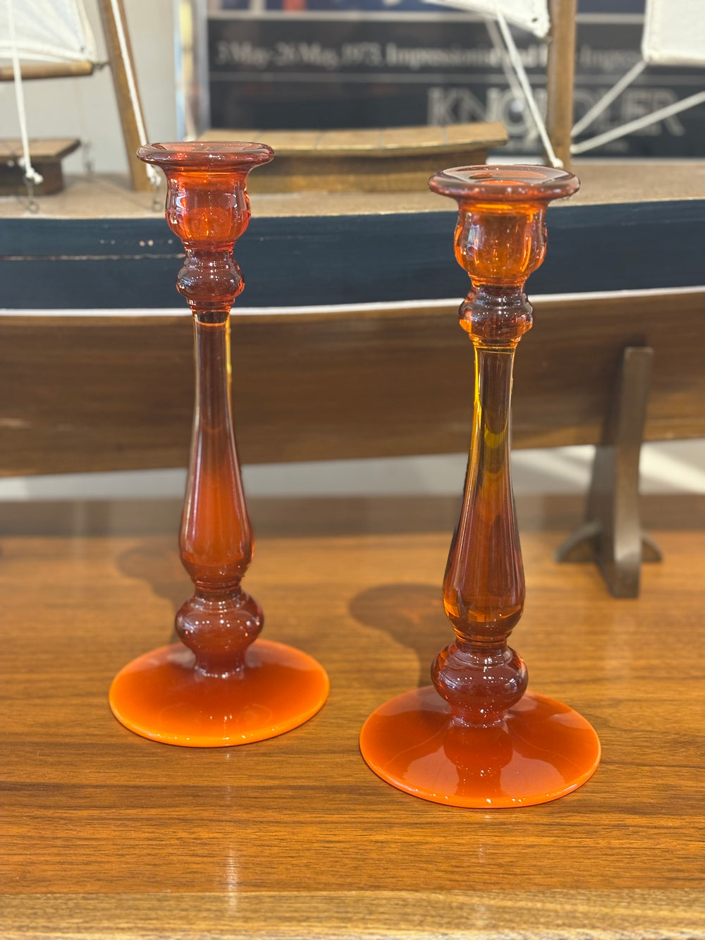 Pair of Tall Amber Glass Candlesticks