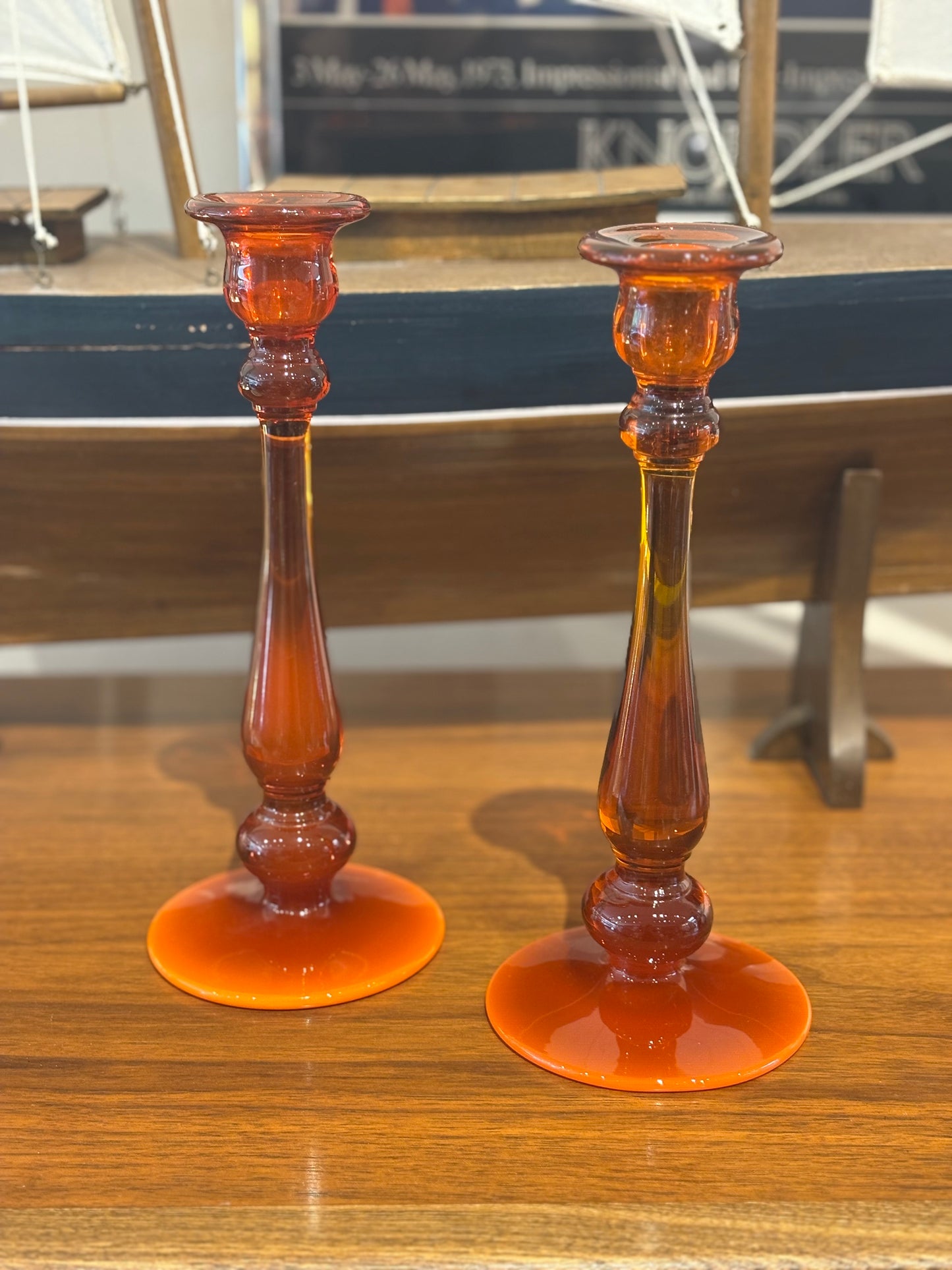 Pair of Tall Amber Glass Candlesticks