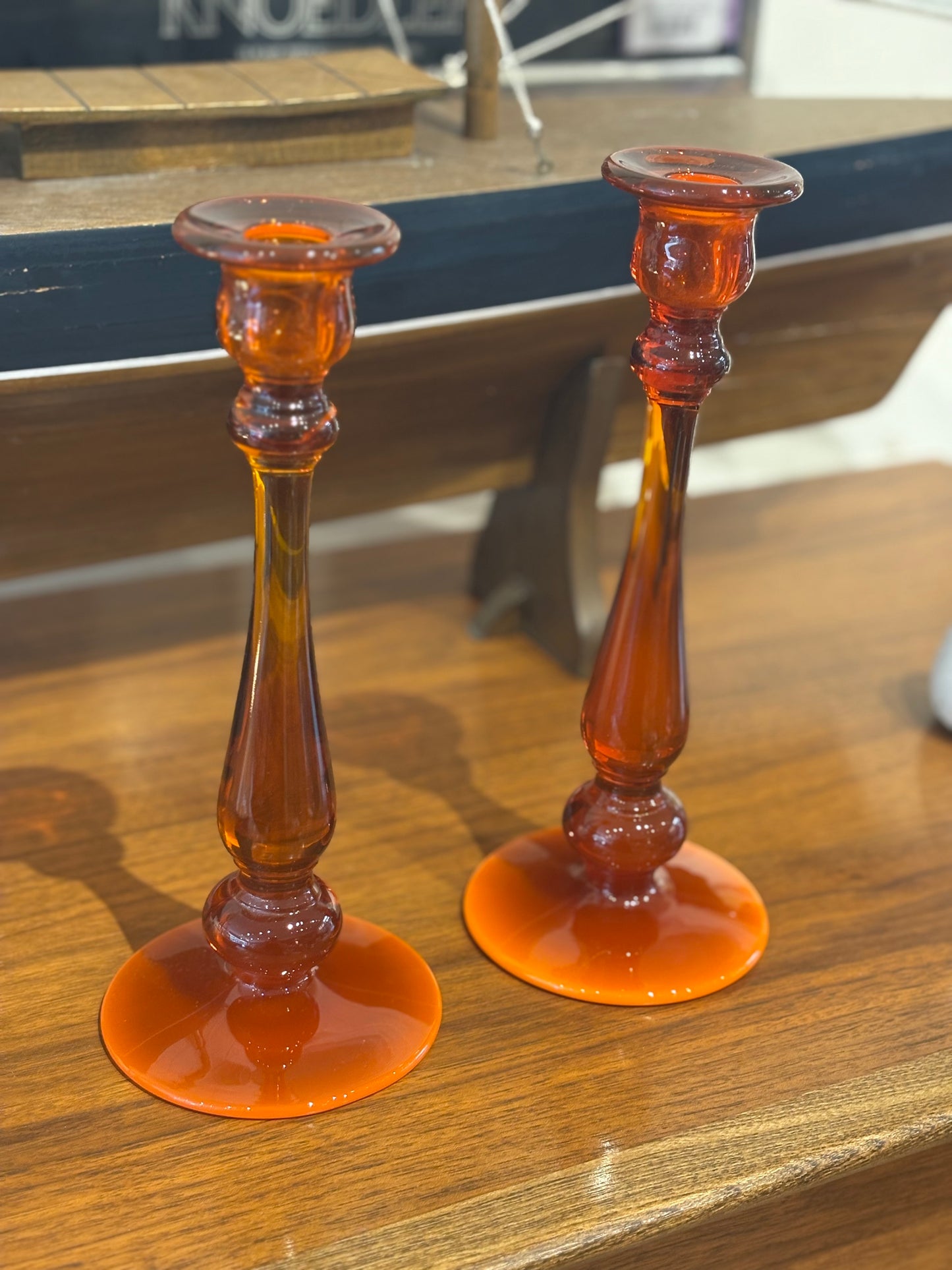 Pair of Tall Amber Glass Candlesticks
