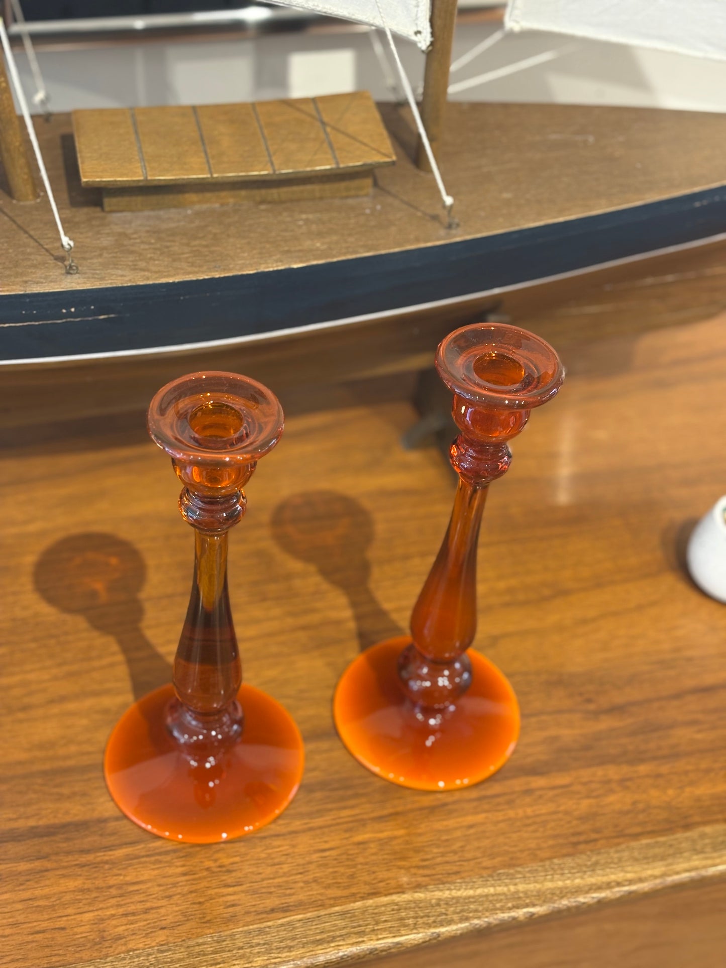 Pair of Tall Amber Glass Candlesticks