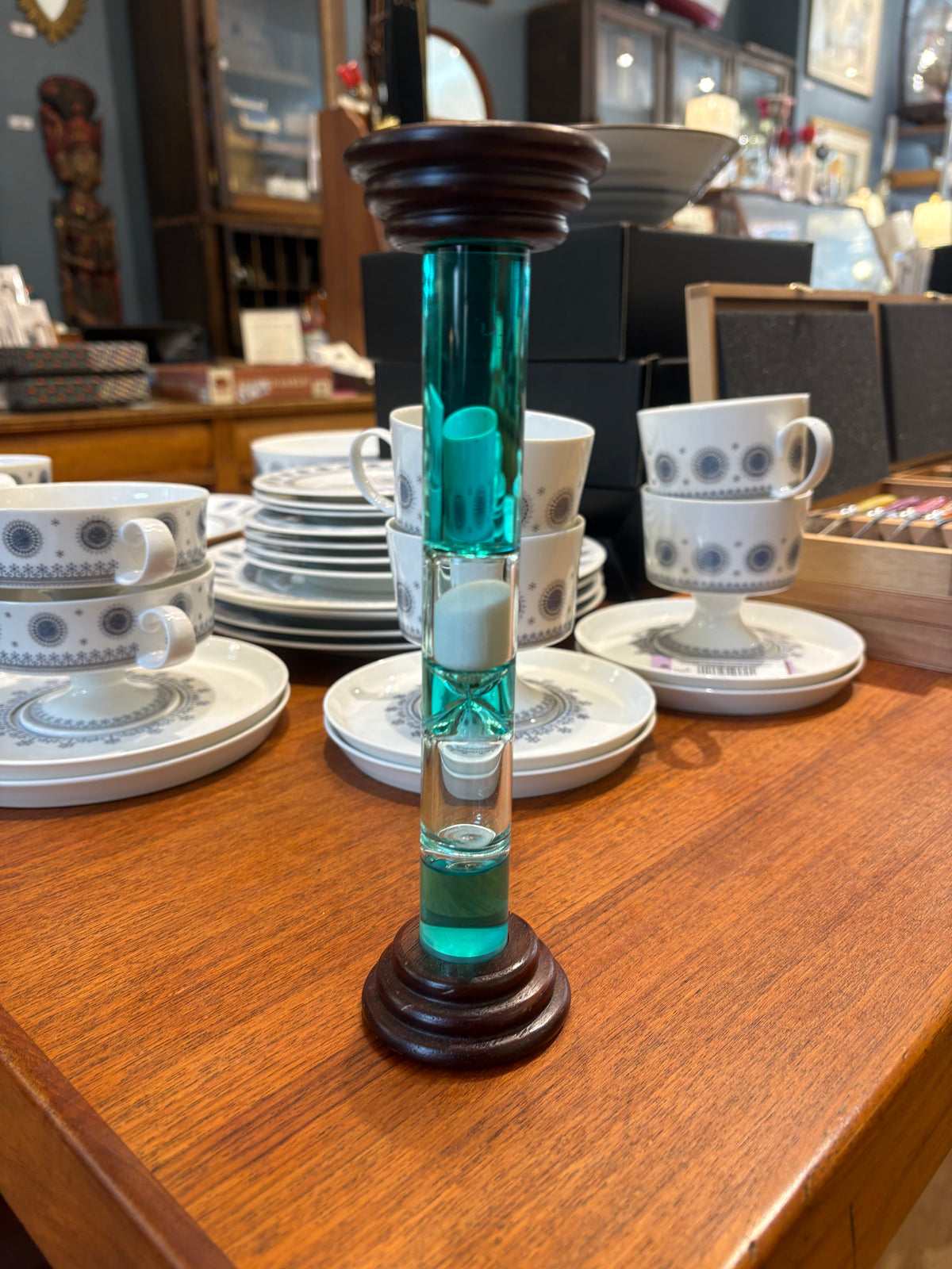 Narrow Teal Liquid and Sand Timer