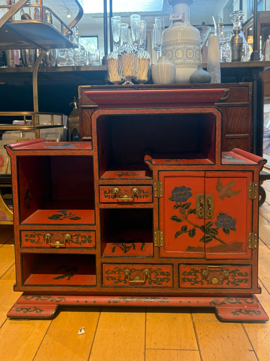Low Red Painted Cabinet with Small Drawers and Nooks