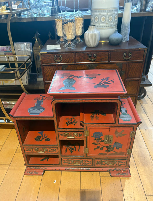 Low Red Painted Cabinet with Small Drawers and Nooks