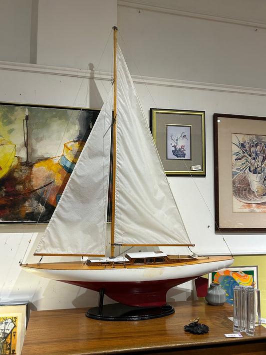 Large Red and White Wooden Sailboat Model on Stand