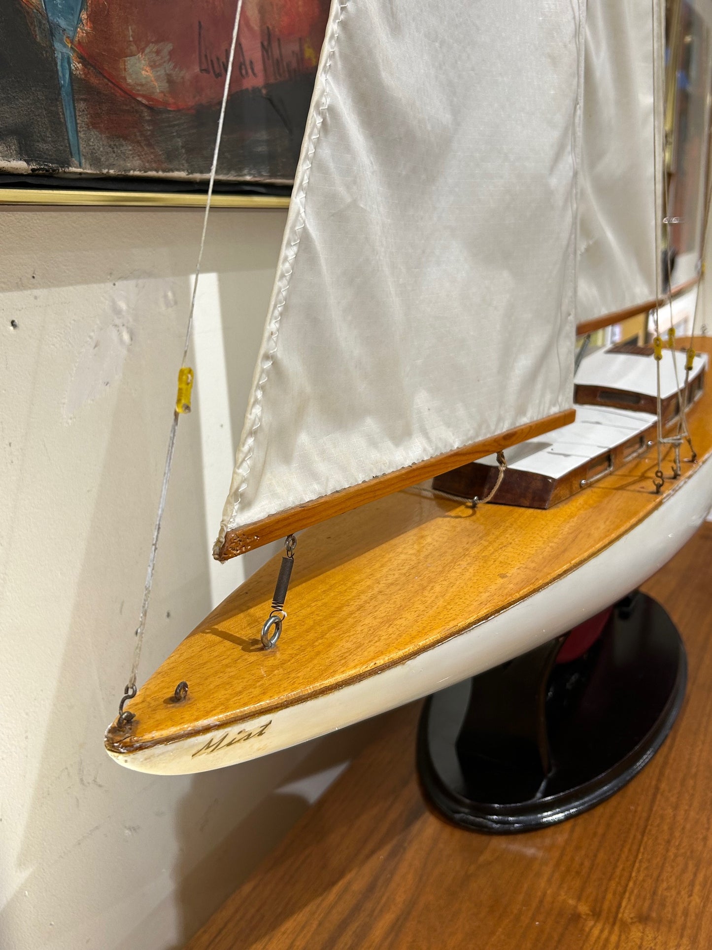 Large Red and White Wooden Sailboat Model on Stand