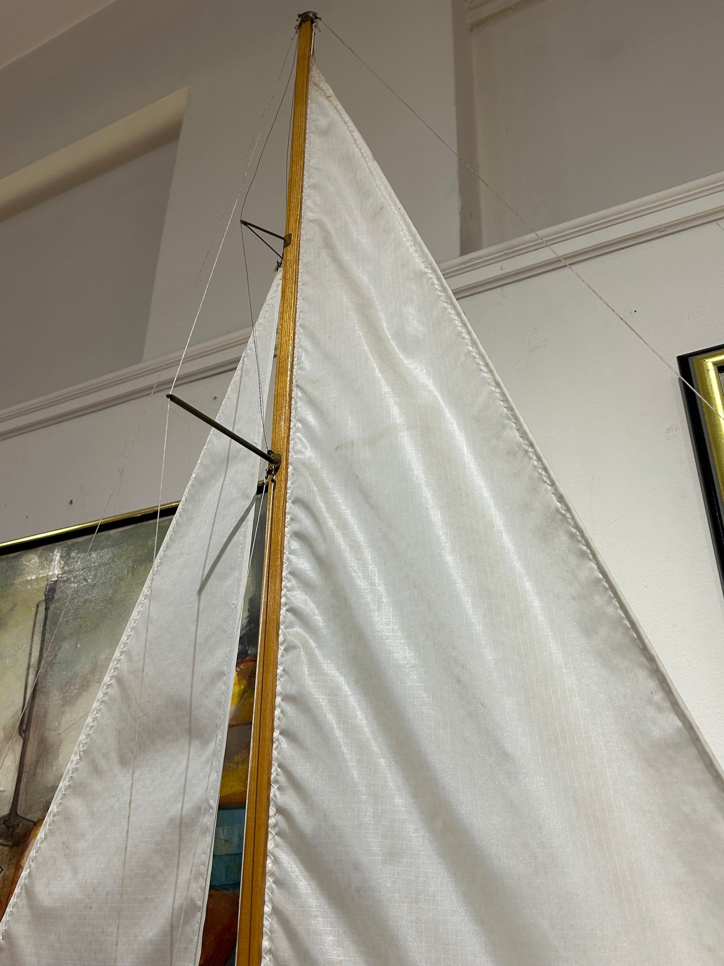 Large Red and White Wooden Sailboat Model on Stand